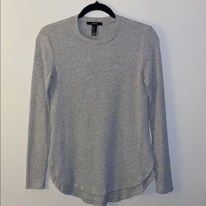 grey top with slip on the sides